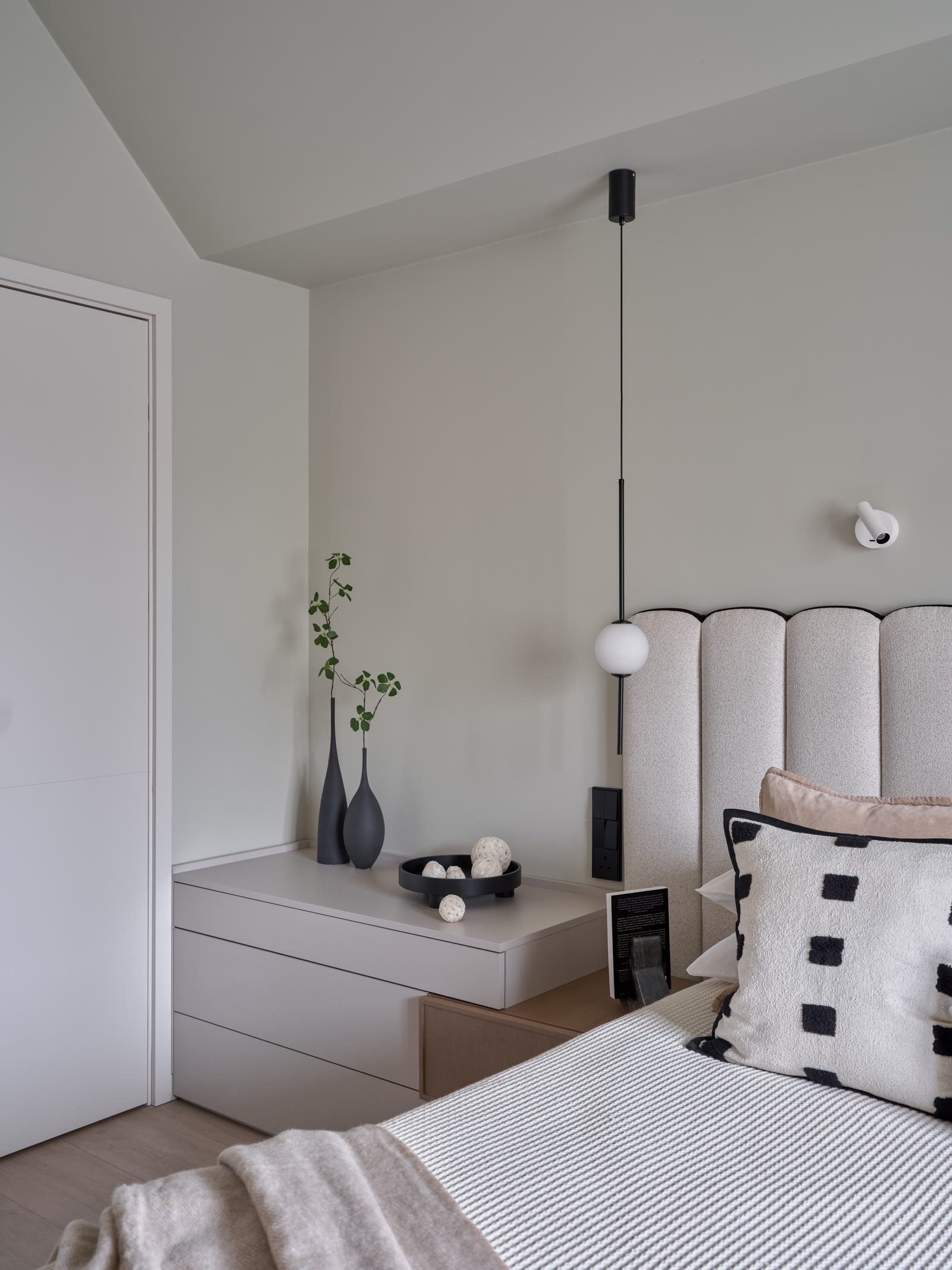 Considered room scheme with bespoke joinery and warm neutral finishes